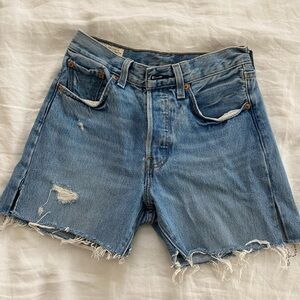 Levi’s 501 Medium Wash distressed shorts
